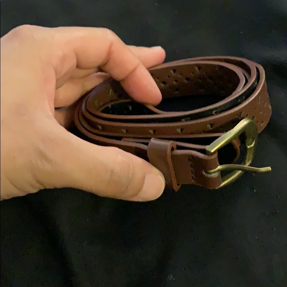 Brown belt with triangles design